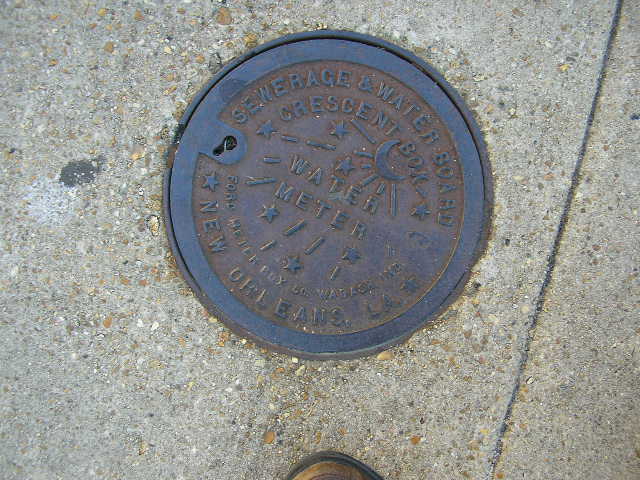 sewer cover from Tampa with a boat on
              it